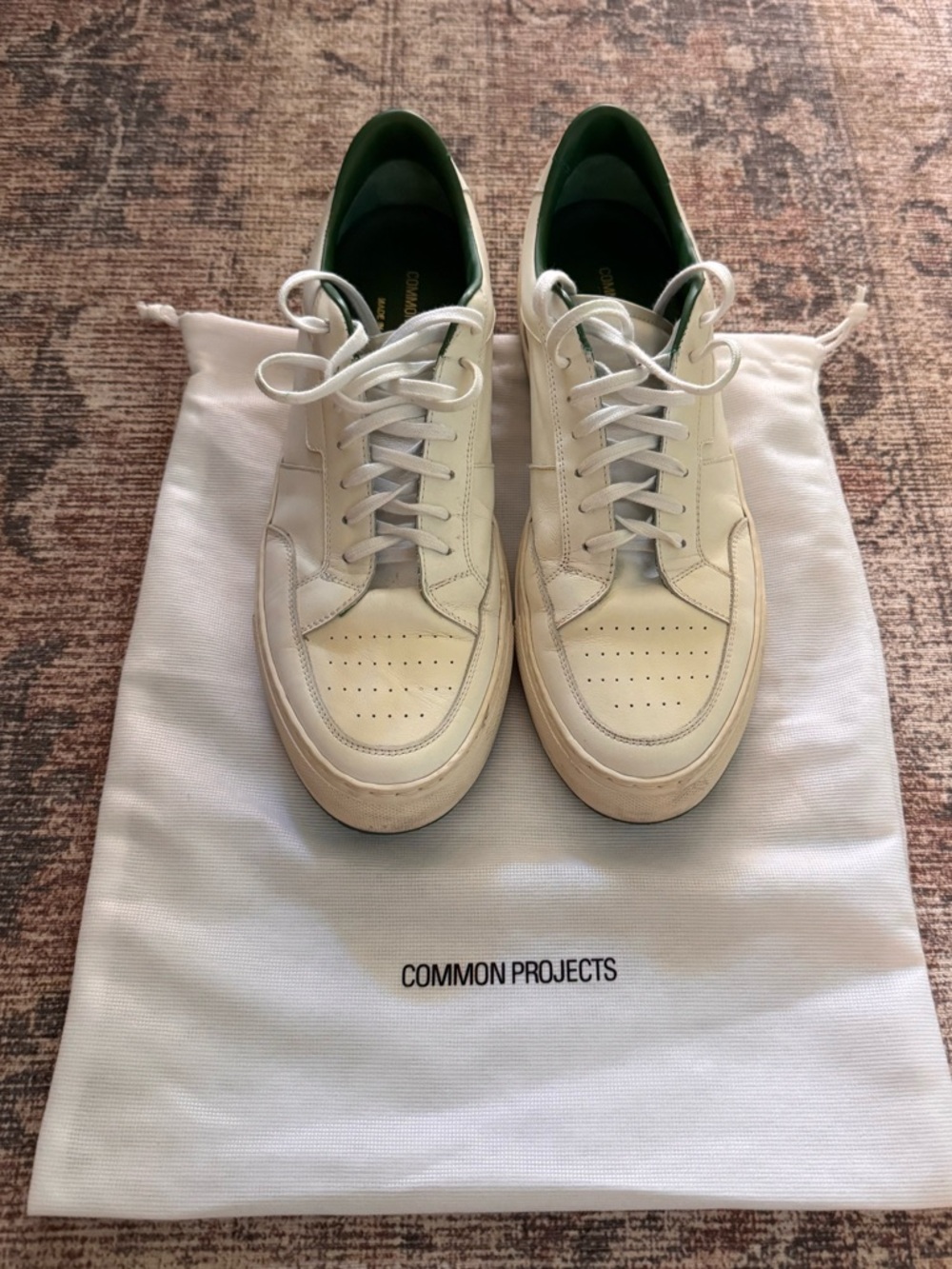 Men’s Common Projects with green lining